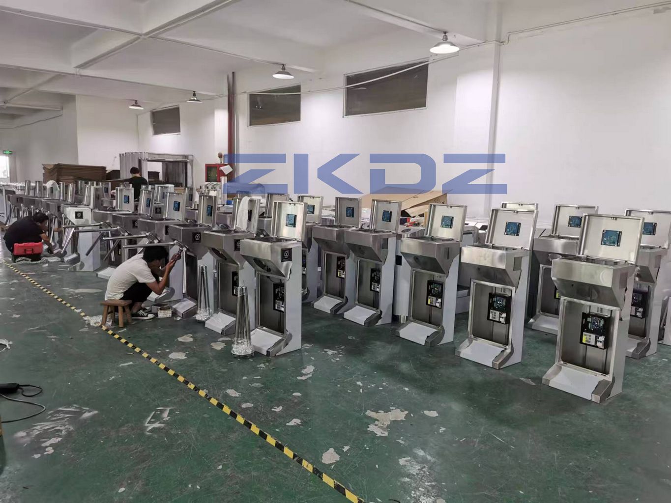 Mass production line of pedestrian barrier turnstile stainless steel chassis in manufacturing plant